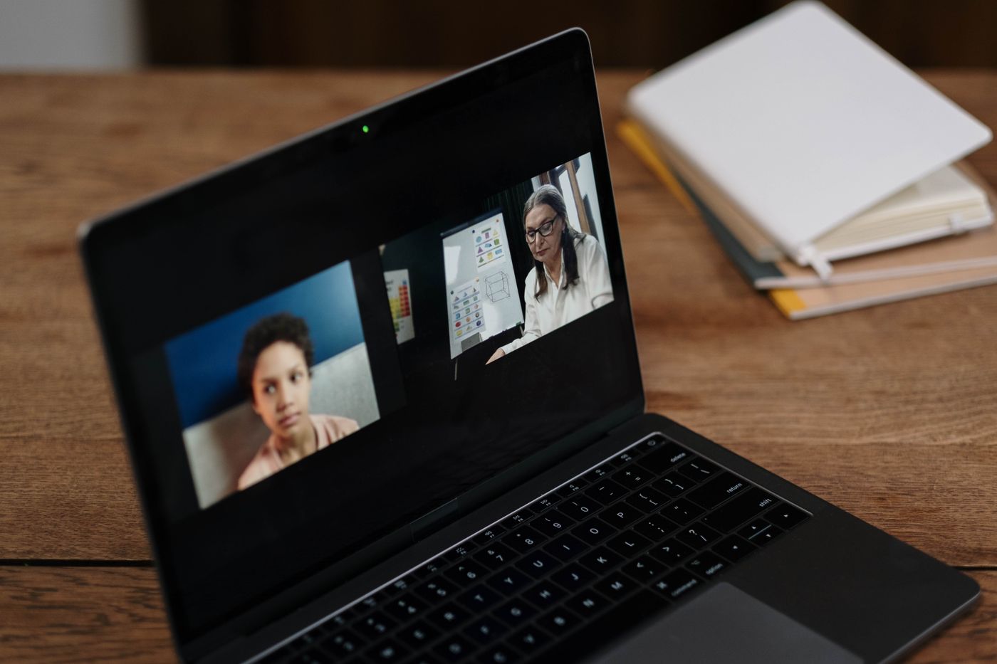 Teacher and student on a video call running a short spoken check after an online English level test